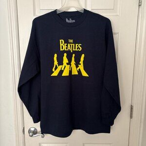 Beatles navy long sleeve band tee. Yellow Abbey Road silhouette graphic.